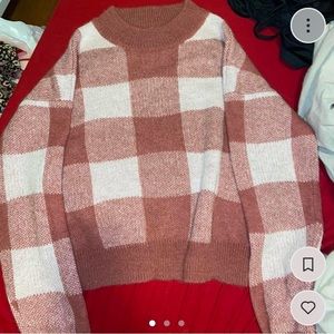 Red, pink, and white sweater